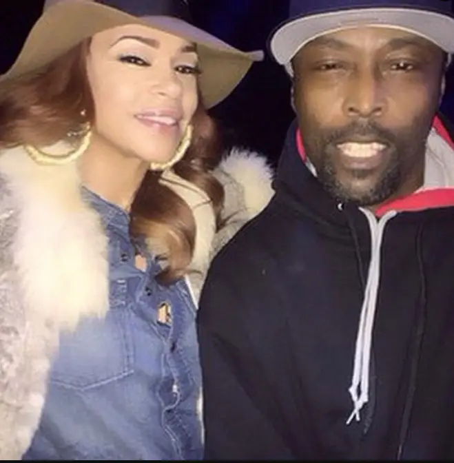 Black Rob with friend Faith Evans